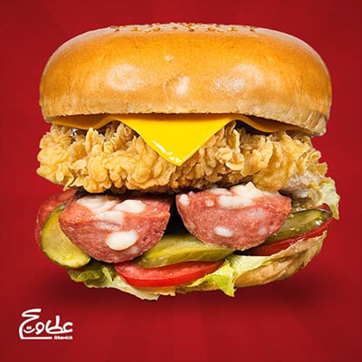 110 گرم کراکف ، 70 گرم فیله مرغ سوخاری شده ، 1عدد پنیر ورقه ای ، 40 گرم سس دیپ گاردن و نان برگر زینگر کراکف